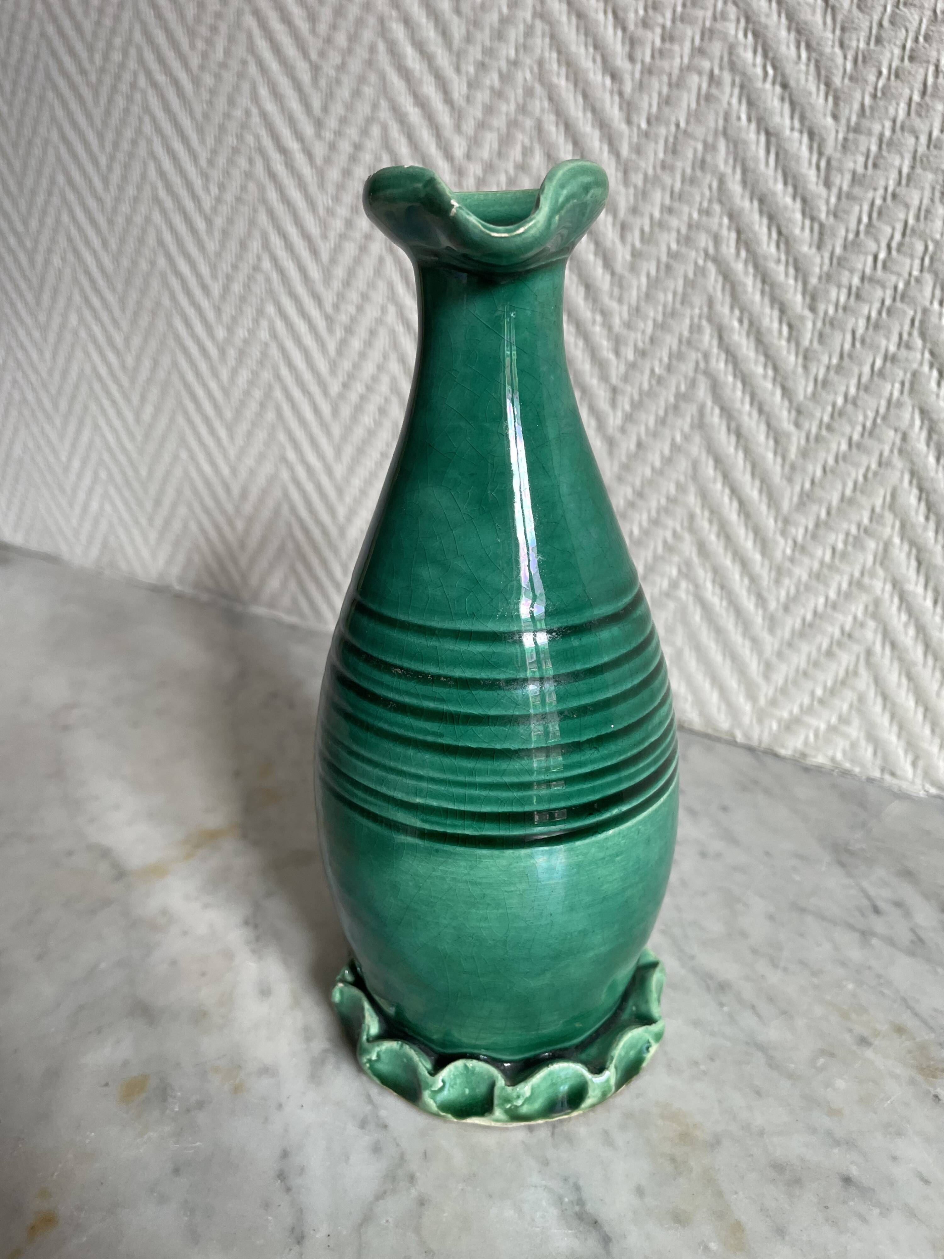 Small green ceramic pitcher