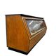 Vintage wooden shop counter with display case