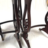 Series of three red lacquered nesting tables with gold decoration in Asian style, nineteenth