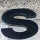 Vintage metal sign letter
