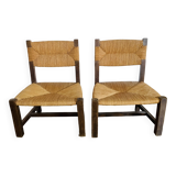 Pair of low wooden and straw armchairs