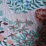 pair of toad armchairs in floral fabric.