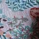 pair of toad armchairs in floral fabric.