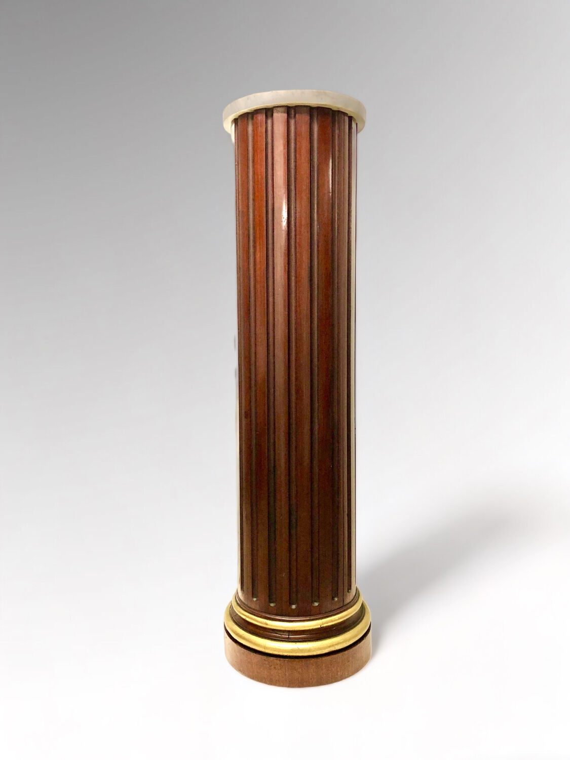 Neoclassical style fluted cylindrical column in mahogany and brass, 19th century