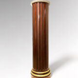 Fluted cylindrical column in mahogany and brass in the neoclassical style. 19th century.