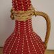 Glass bottle and rattan and scoubidou braiding 1960