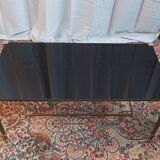 Table basse vintage en laiton et verre