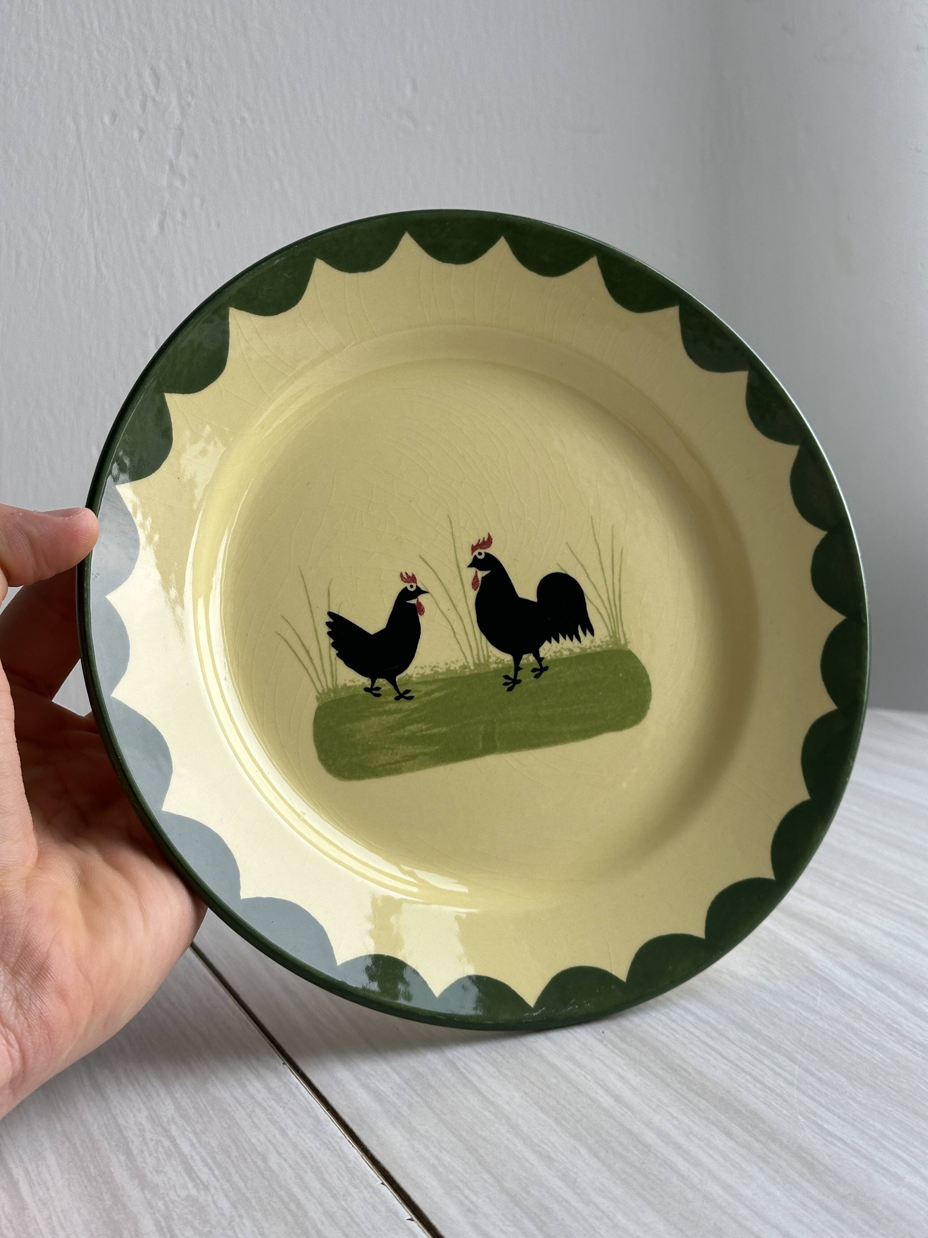 “Teller Keramik” ceramic plate with rooster motif.