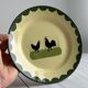 “Teller Keramik” ceramic plate with rooster motif.