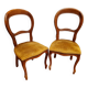 Pair of wooden chairs with velvet seats
