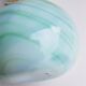 Vase en verre vert pastel