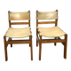 Pair of Maison Regain leather chairs