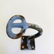 Enamelled cast iron hook
