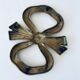 Dessous de plat en laiton forme noeud