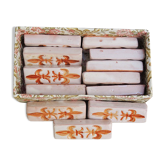 12 ancient fleur de lys knife holders in terracotta