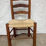 Brutalist chairs in walnut and straw