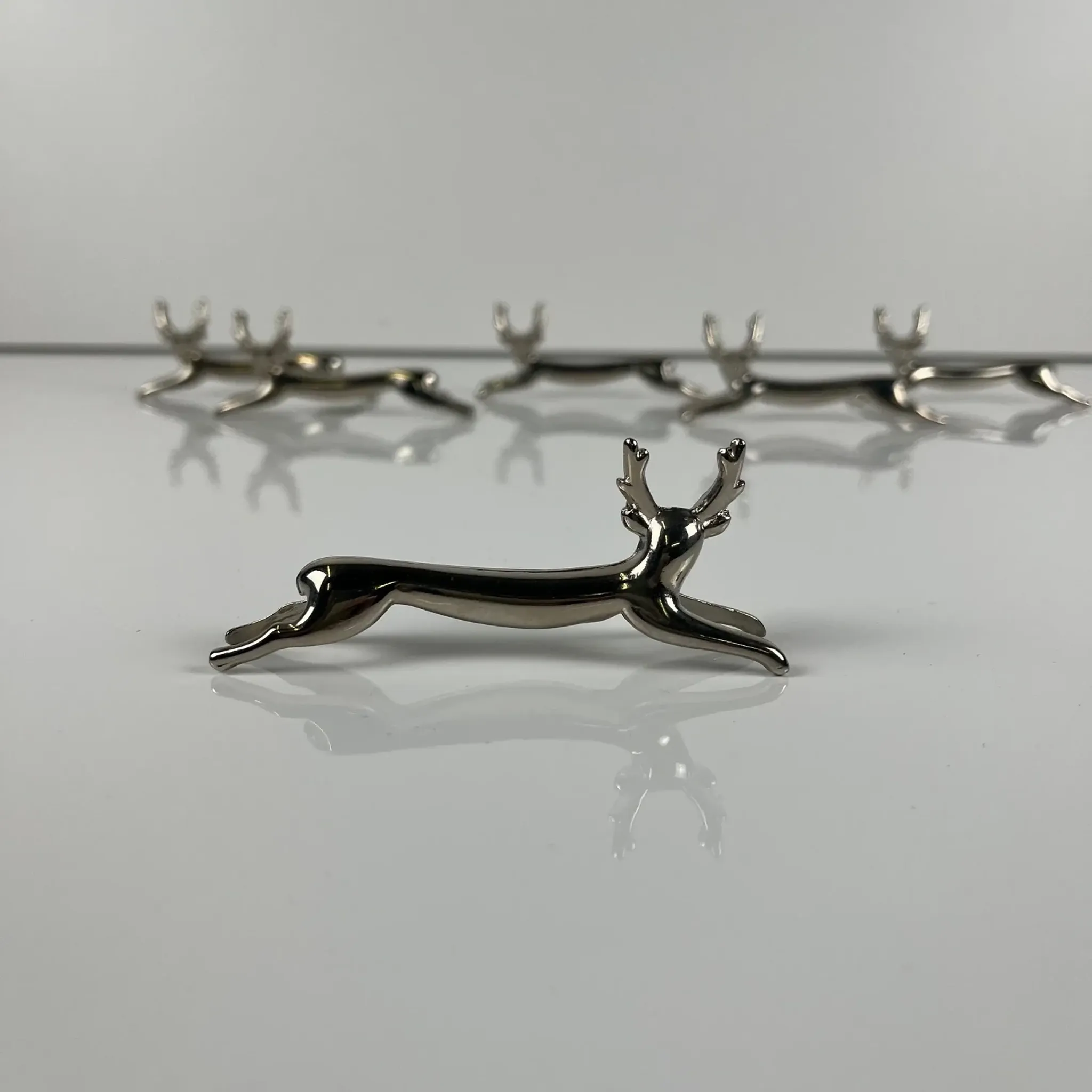 Set of 6 metal knife rests, "Deer / stag" model, 1980-90.