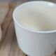 Set of 3 vintage ceramic cups with floral decoration.