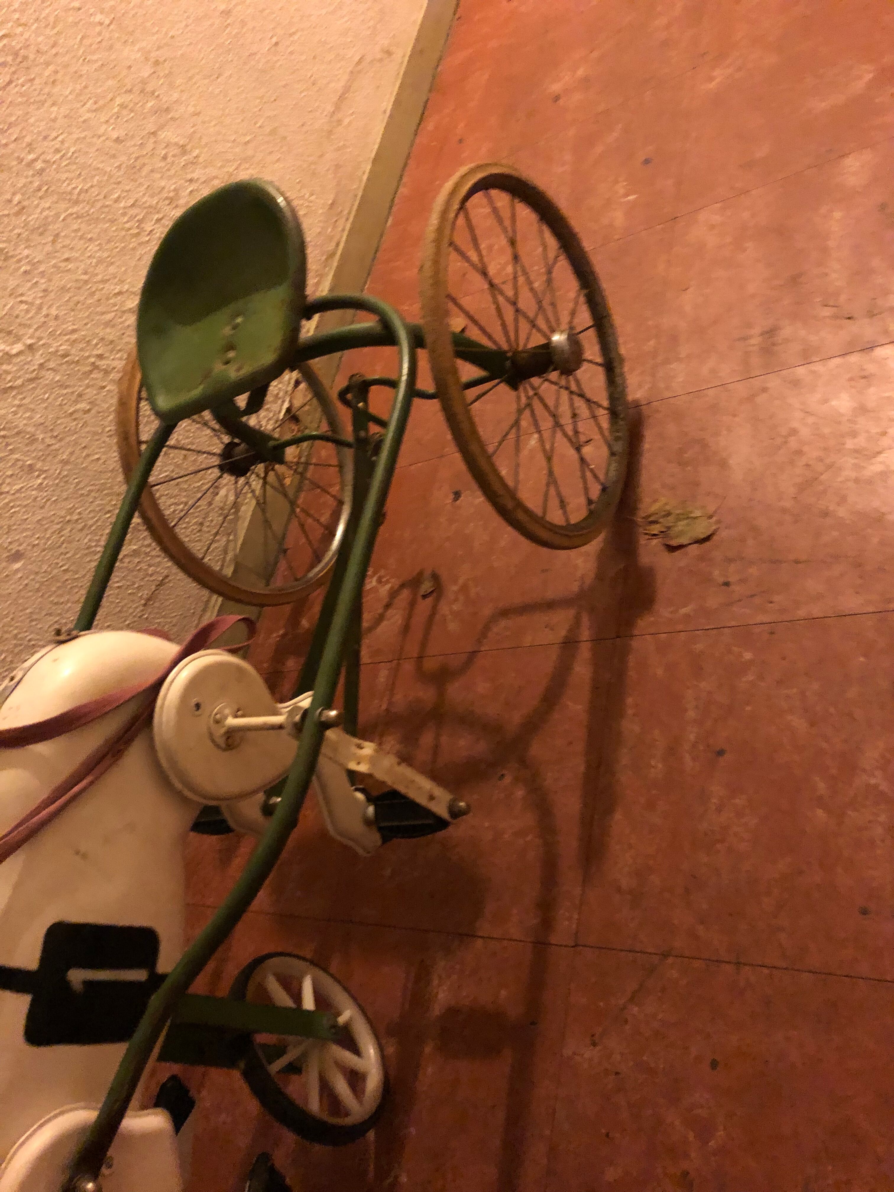 Old pedal horse with sulky