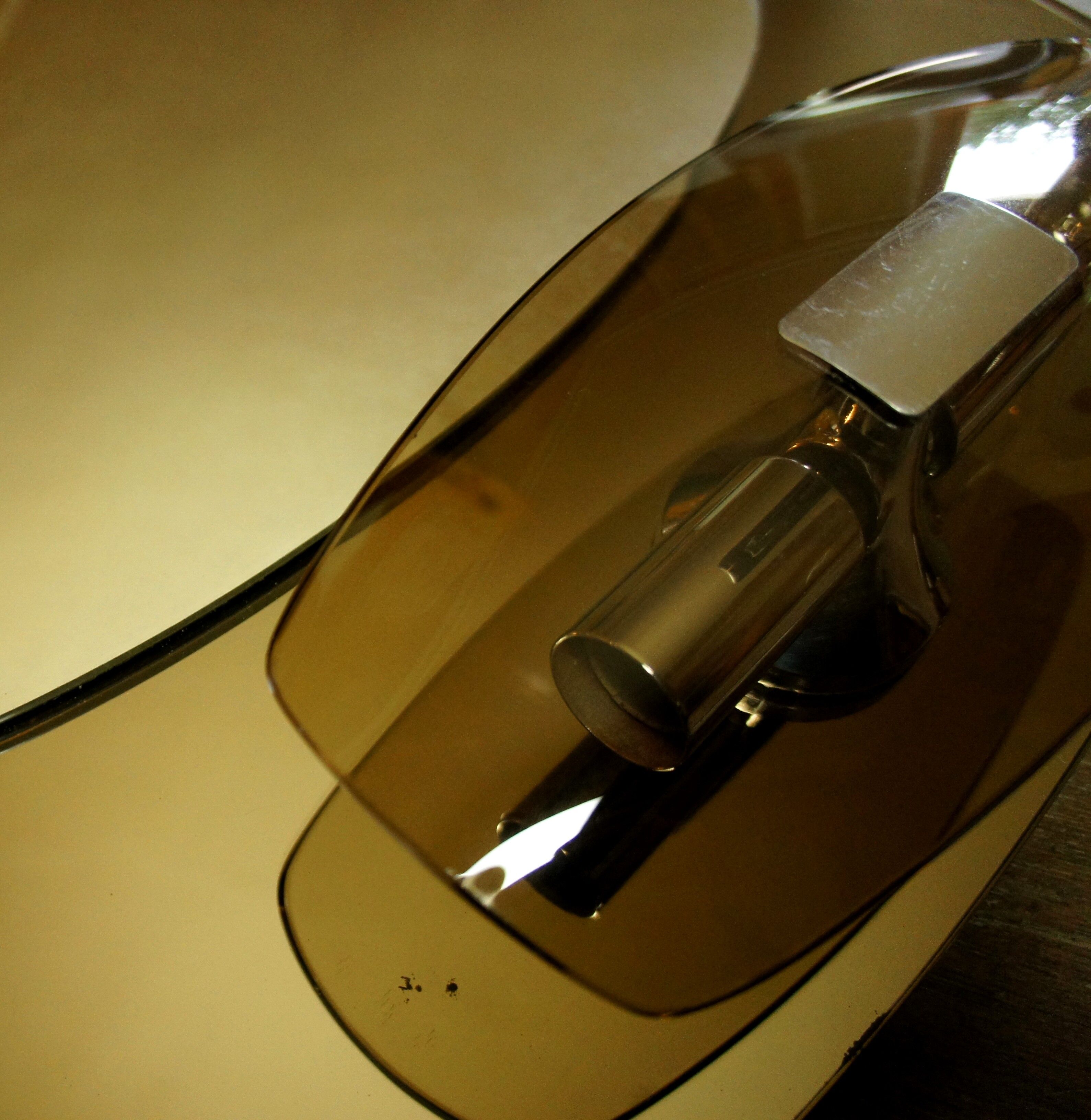 Light mirror in bronze tinted curved smoked glass