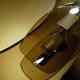 Light mirror in bronze tinted curved smoked glass