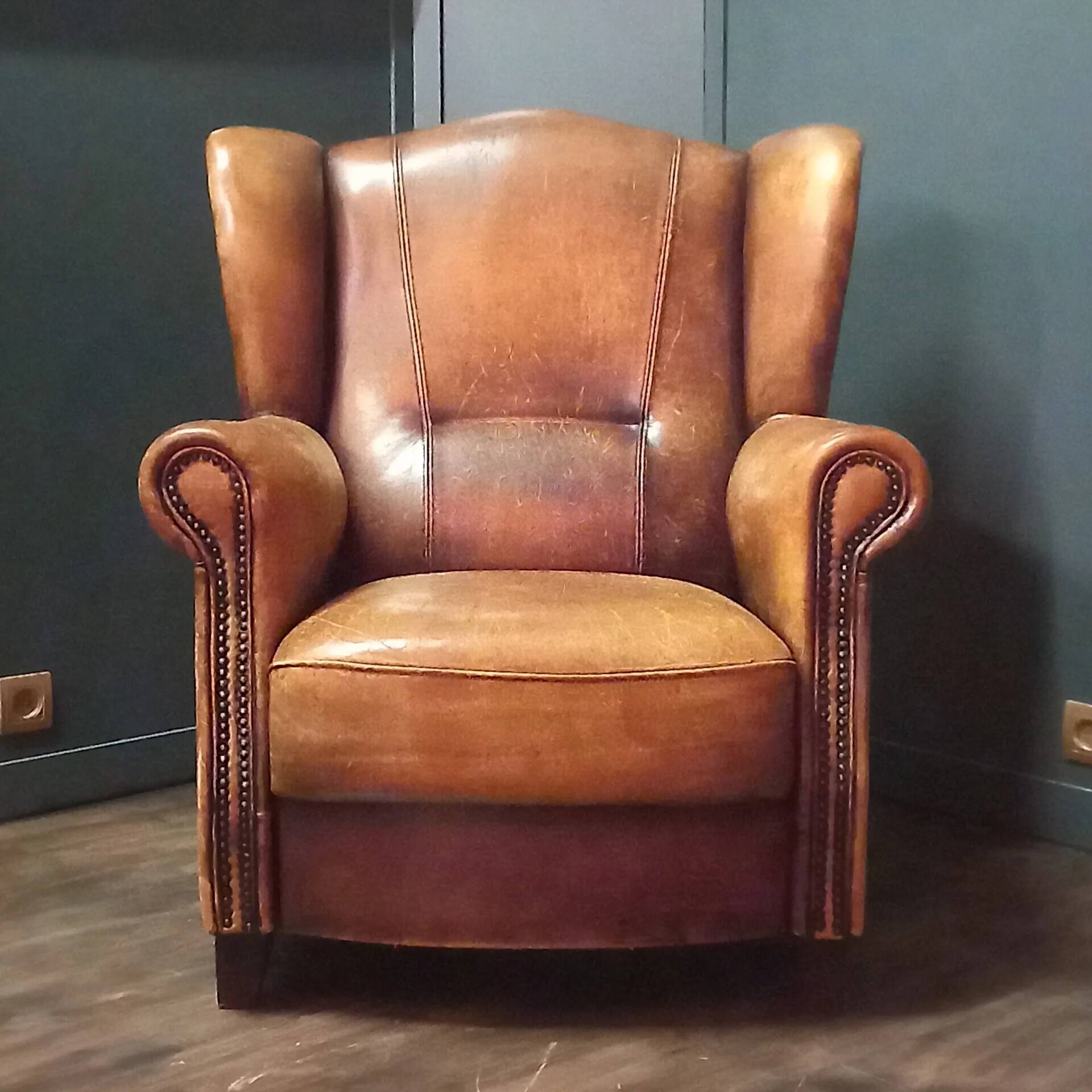 Robust vintage sheepskin armchair