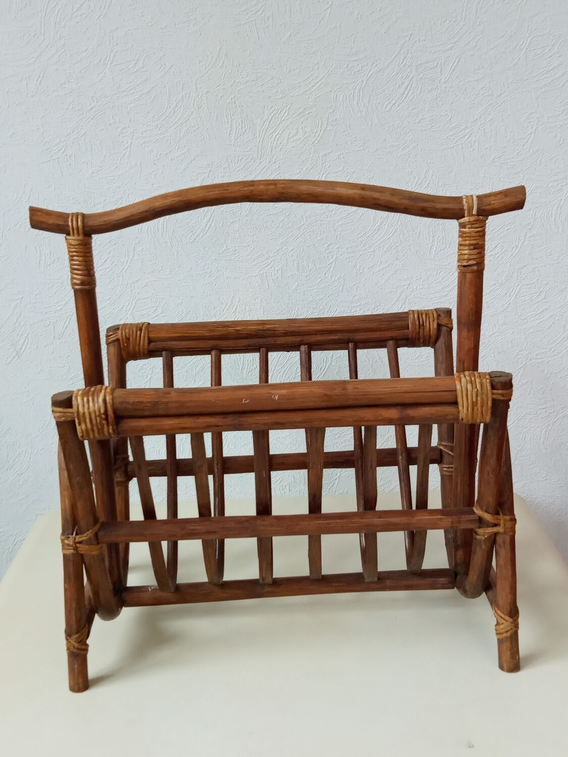 Vintage rattan magazine holder