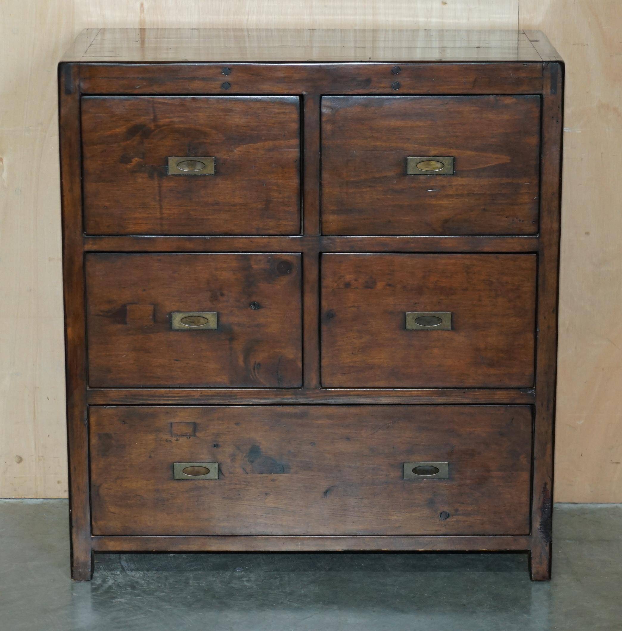 Large vintage hardwood furniture in military country style.