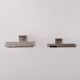 Pair of vintage geometric adjustable wall lights in chrome metal, France 70s.