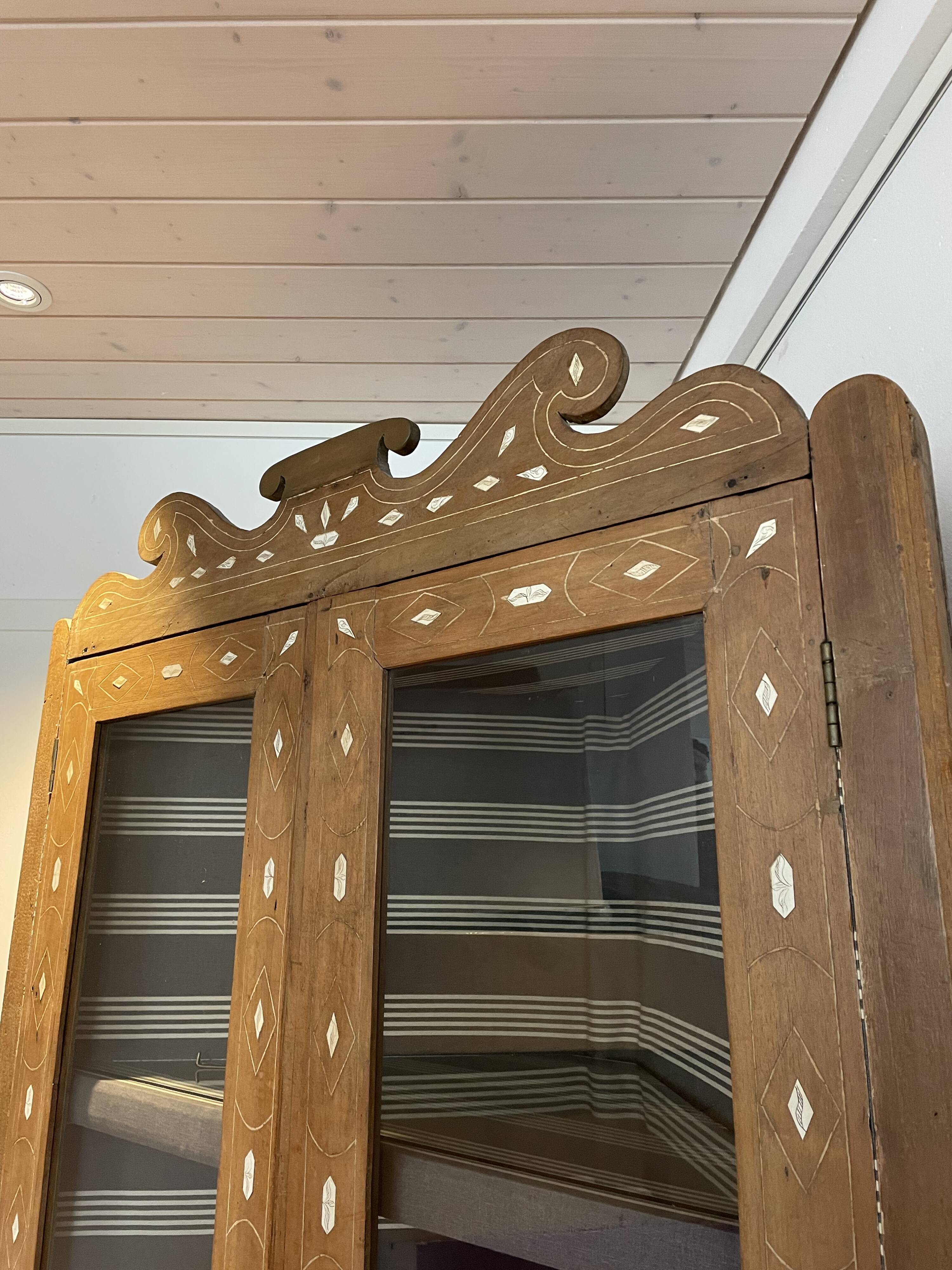 Oriental corner cabinet