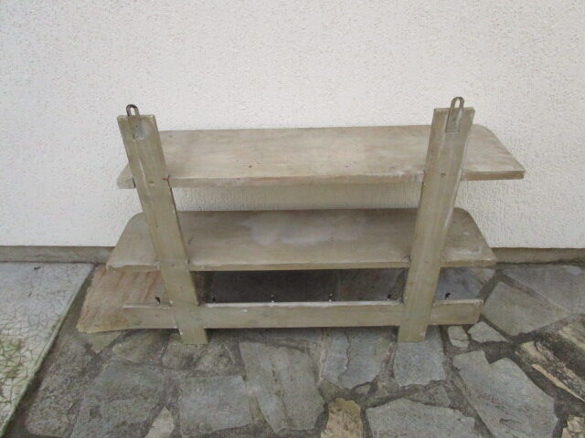 Old wall workshop shelf with coat rack