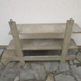 Old wall workshop shelf with coat rack