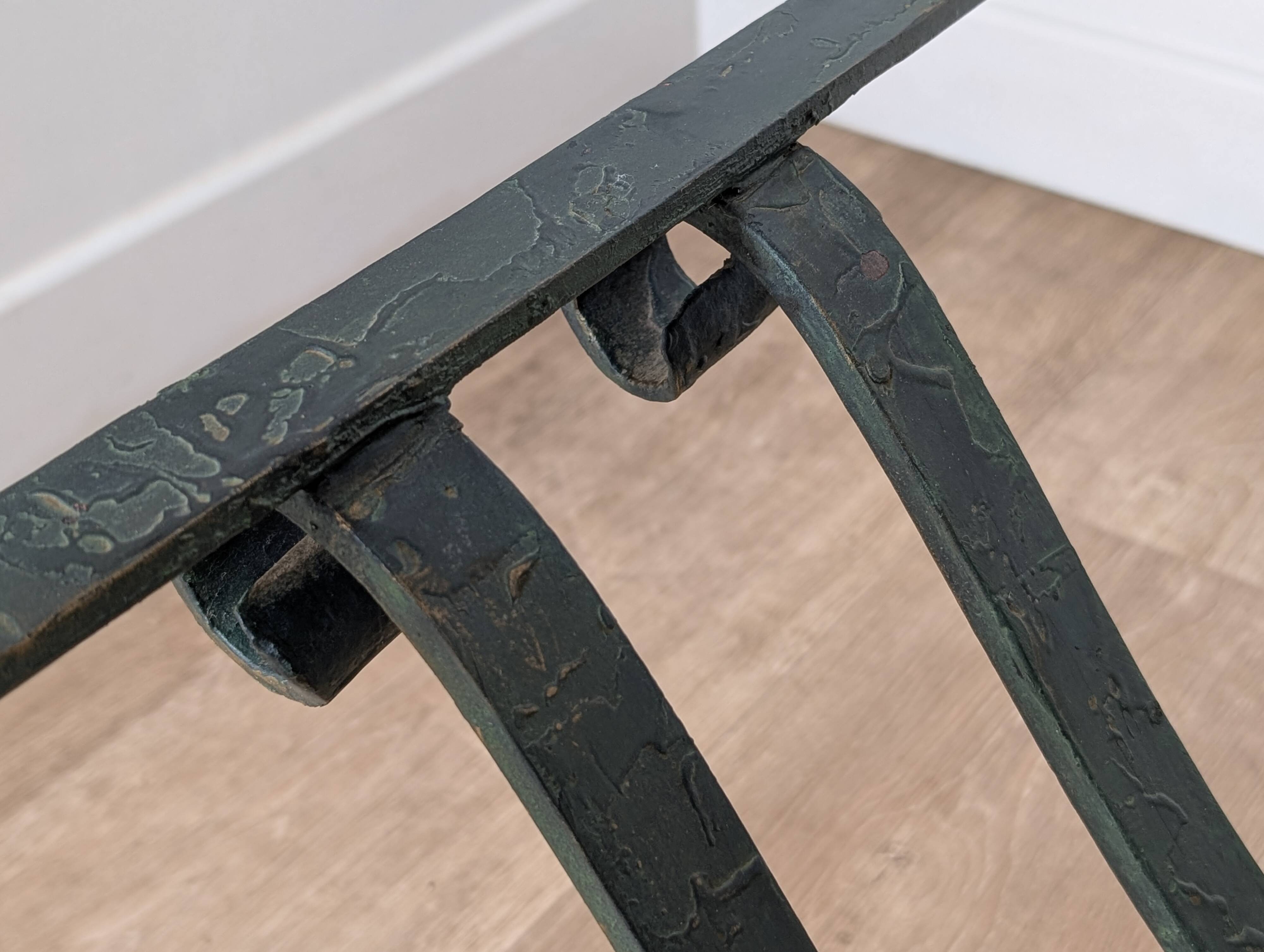 Wrought iron and glass coffee table