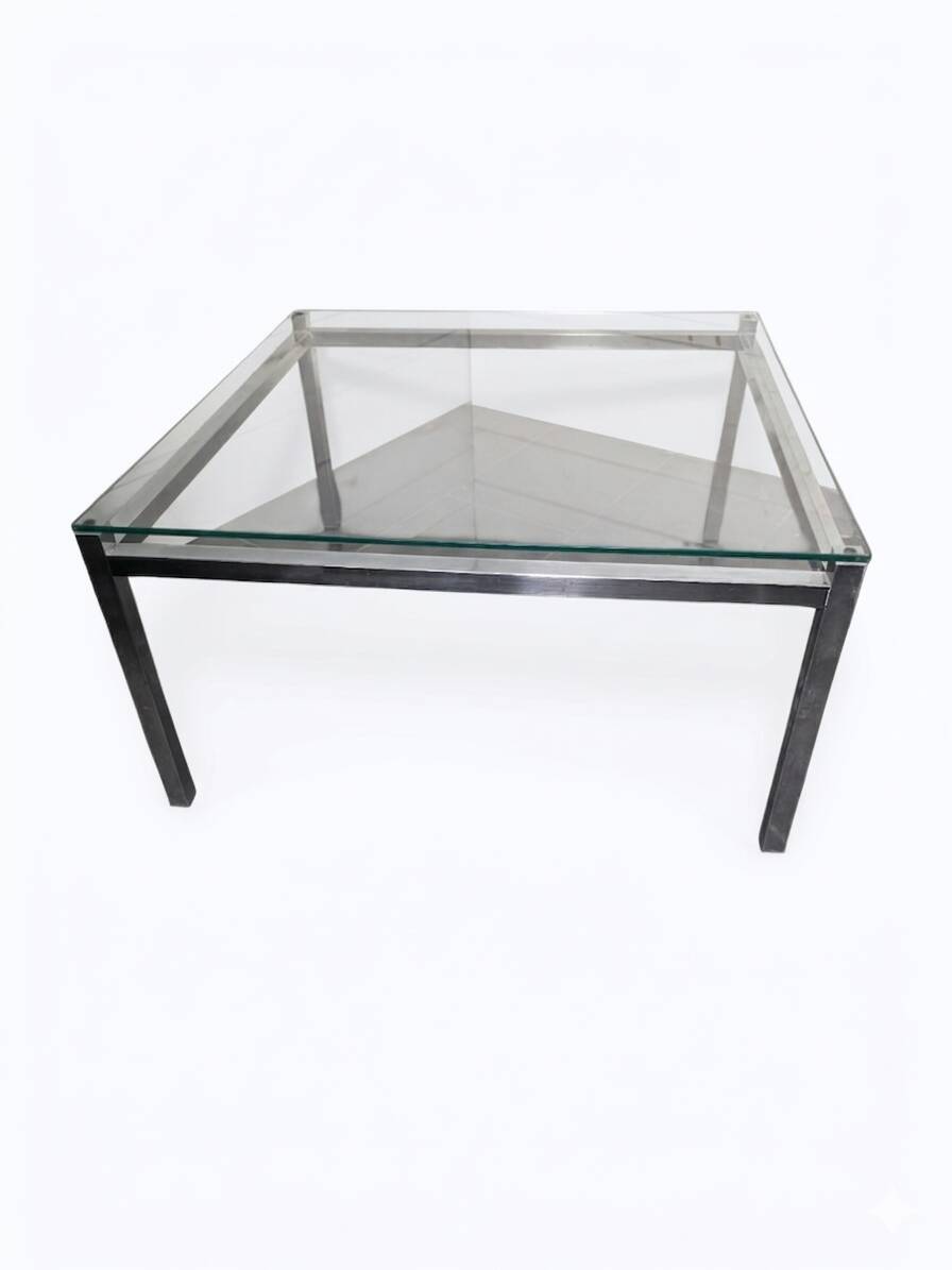Chrome metal coffee table with a glass top from the 1970s.