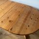 Round solid pine dining table with 2 extensions