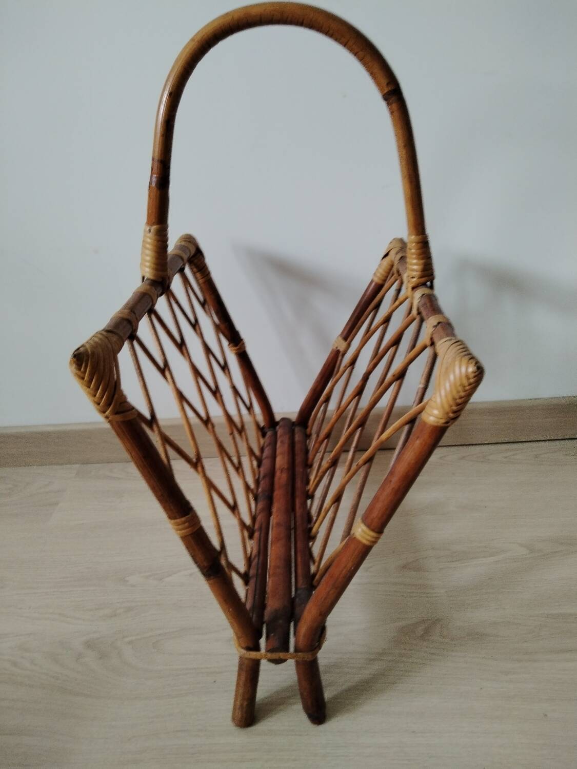 Rattan magazine rack from the 1950s