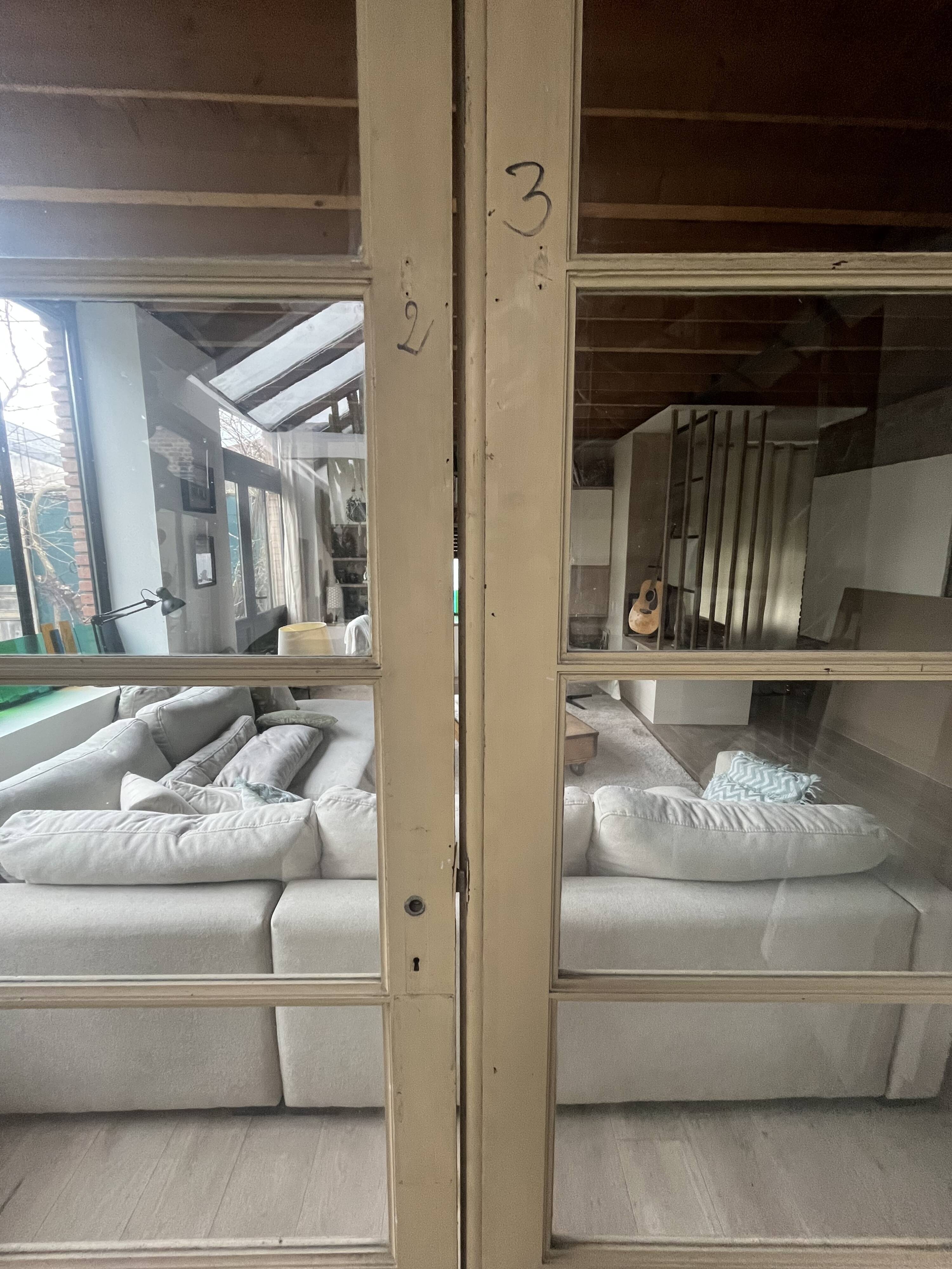 set of four large glass partition doors