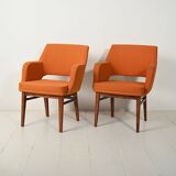 Pair of orange Oslosund armchairs by Kinnarps, 1950s