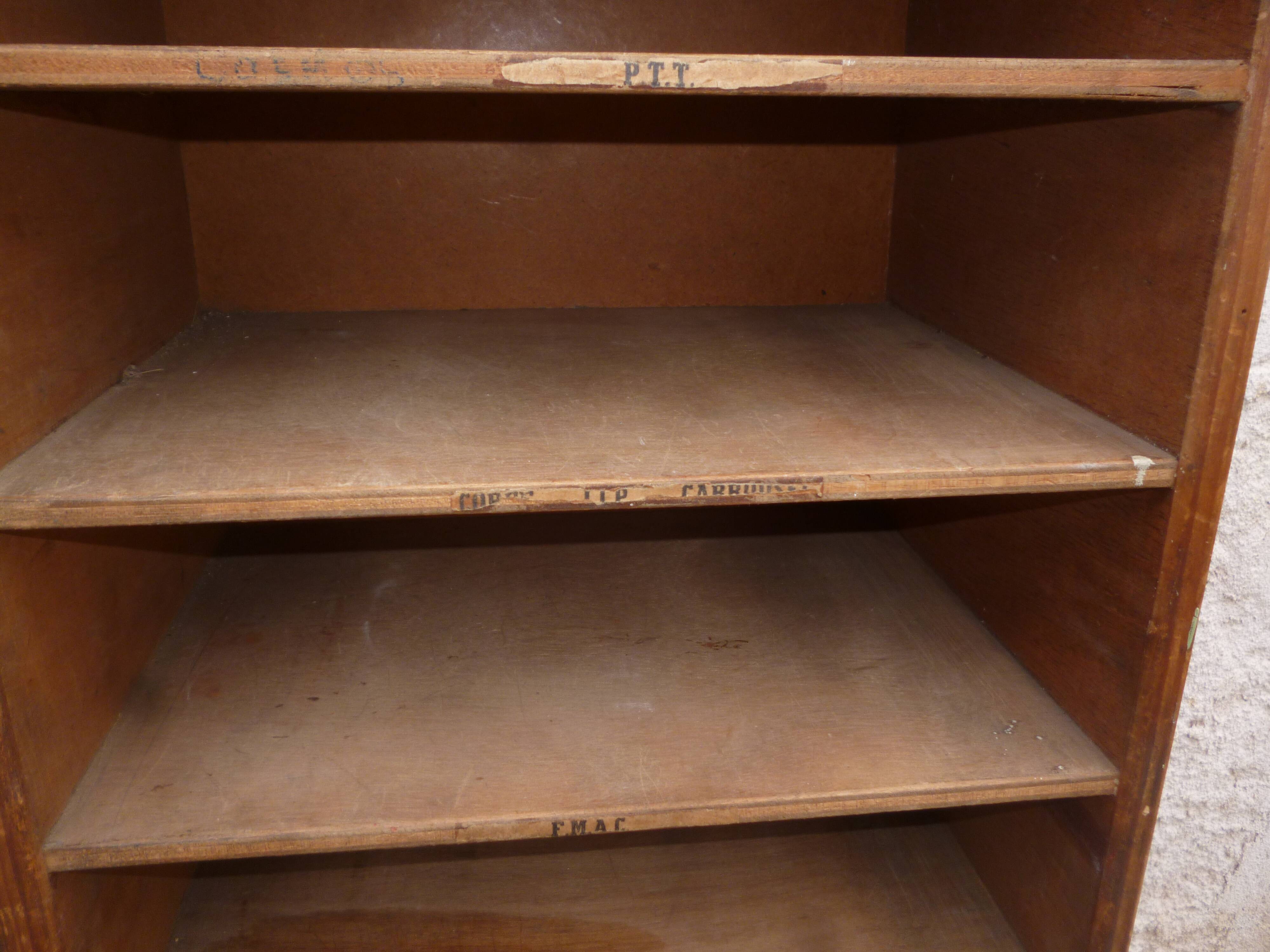 Sorting wood locker cabinet with Vintage labels