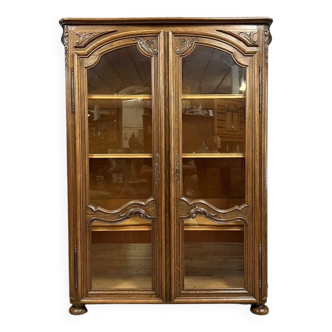 Bibliothèque galbée style Régence en chêne blond vers 1900
