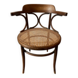 Cane and curved wood armchair