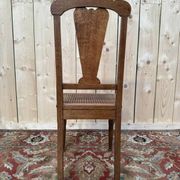 Suite de 4 chaises époque Art Déco en cannage