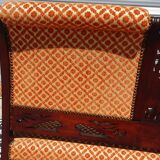 Old wooden and velvet bench