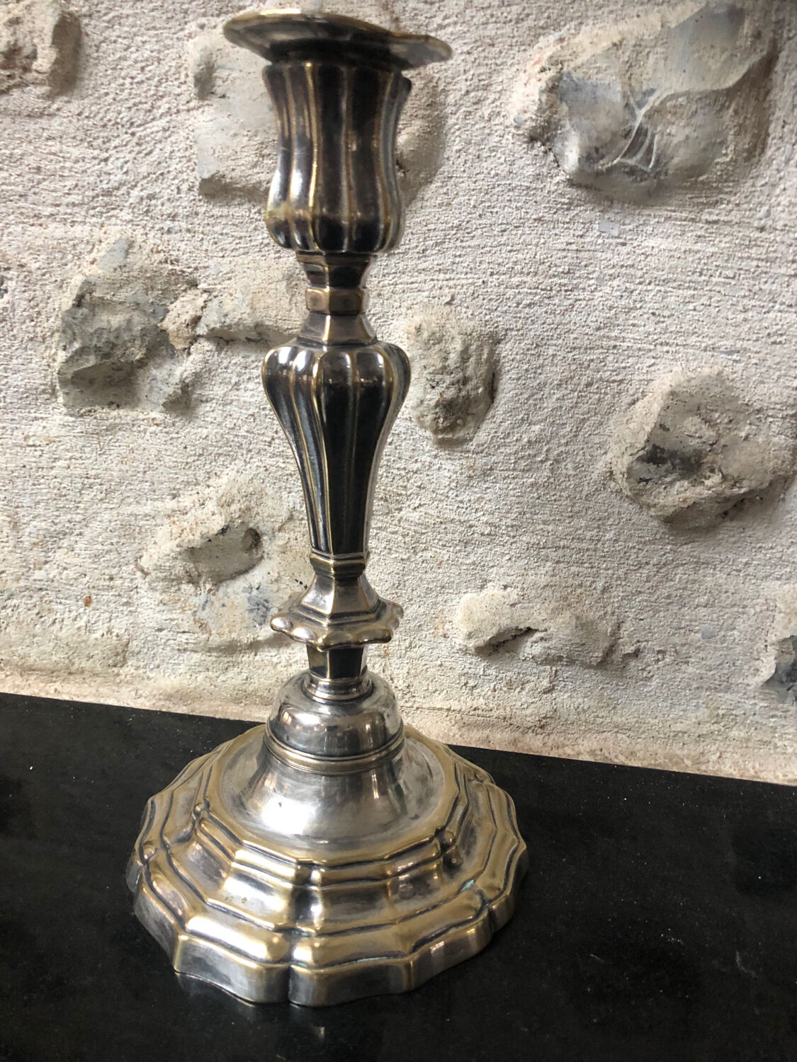 Antique candle holder in silvered bronze