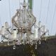 Antique crystal chandelier with 8 lights and drop pendants -
