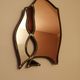 Handcrafted stained glass combining mirrors and glass, cloisonné on metal (Paris).