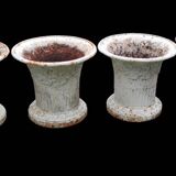 Série de 4 anciens cache-pots en fonte