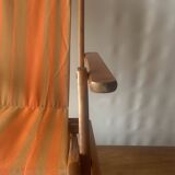 Old foldable beach seat in wood and canvas for children