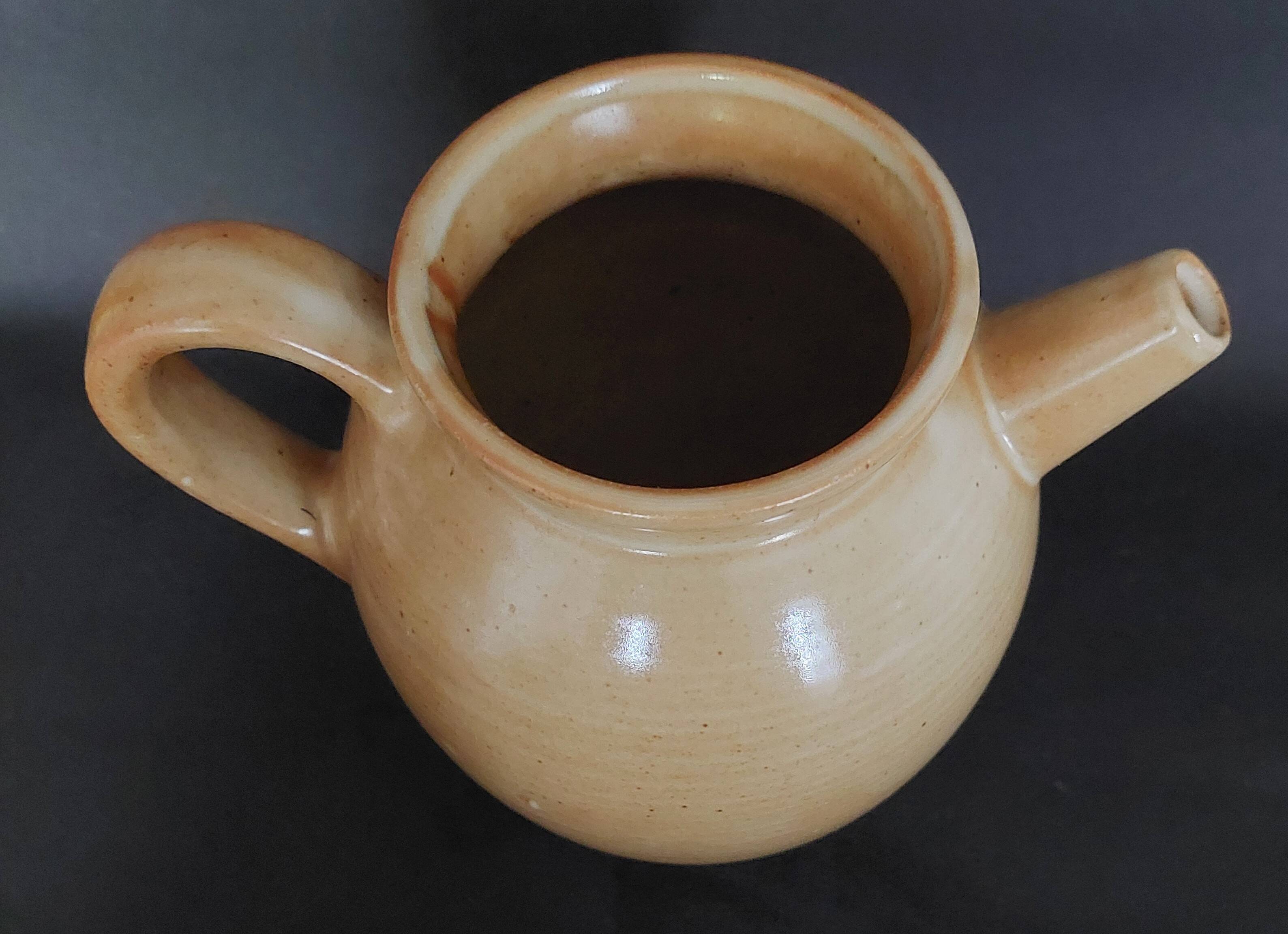 20th century village stoneware goat jug