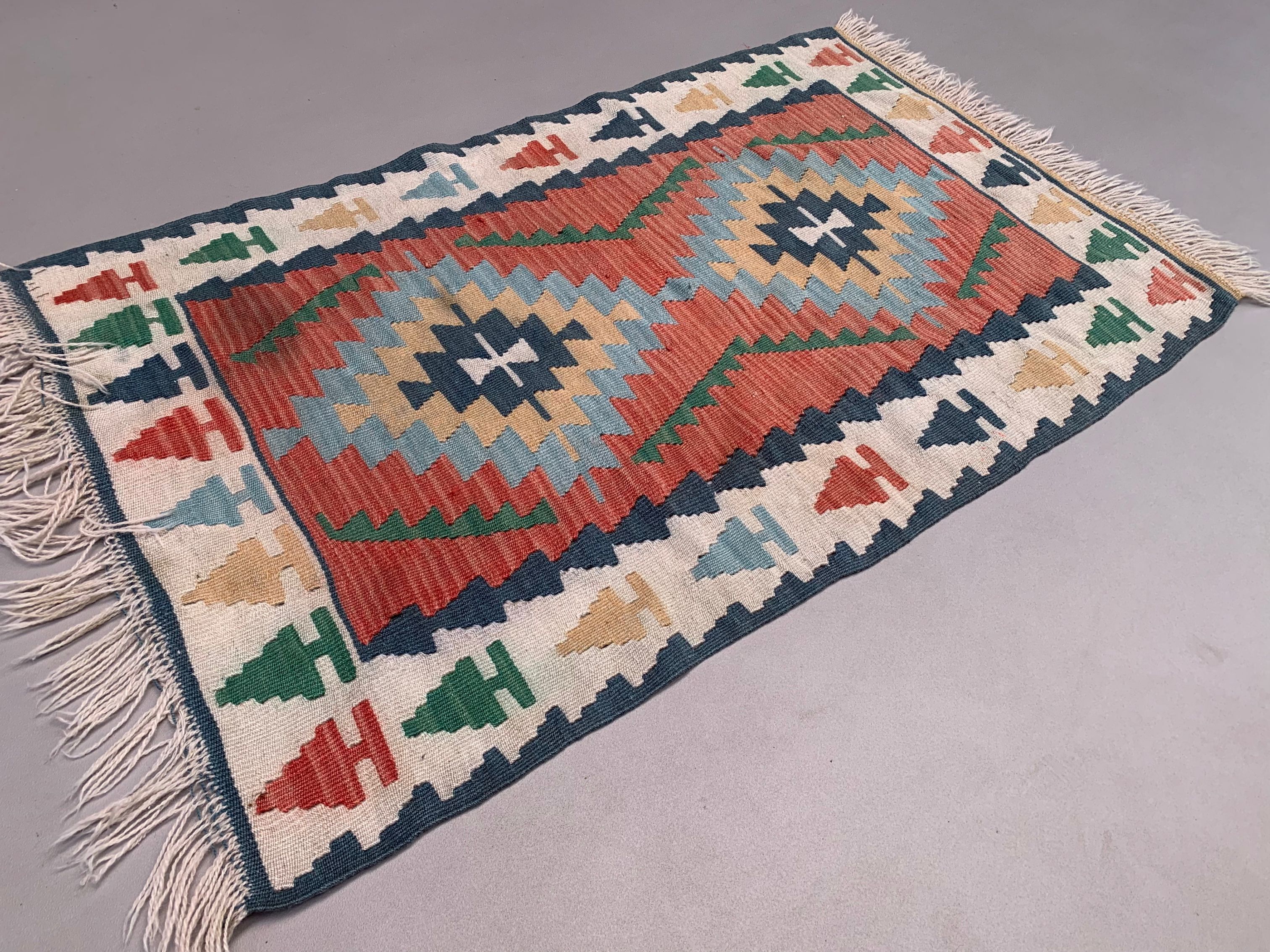 Vintage turkish kilim 130x78 cm wool kelim rug red blue